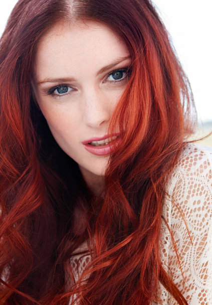 Red hair, woman and face outdoor with beauty care with cosmetics and makeup. Female person, young model and portrait with ginger and beautiful redhead hairstylist treatment with skin cosmetic. - Foto, imagen