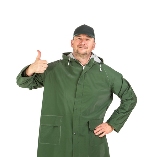 Worker Man in green jacket - 写真・画像