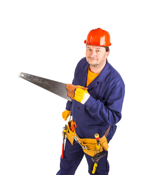 Worker with hand saw - Foto, Bild