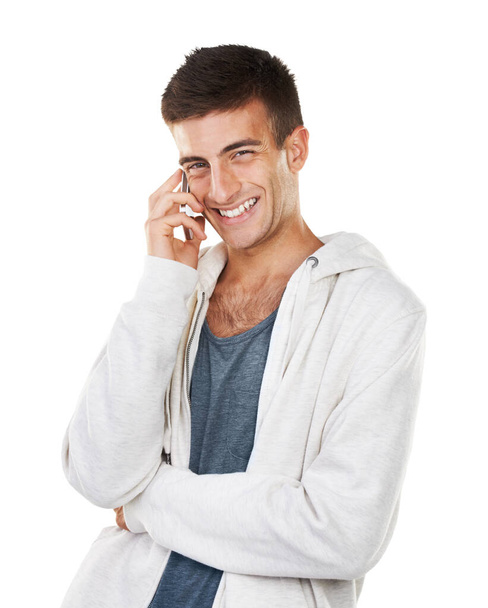 Technology brings people closer together. Portrait of a smiling male talking on his cellphone - Фото, зображення
