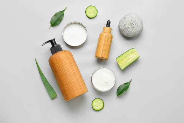 Composition with natural cosmetic products and ingredients on light background - Φωτογραφία, εικόνα