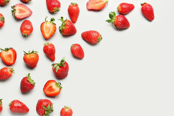 Fresh strawberries on white background - Фото, изображение