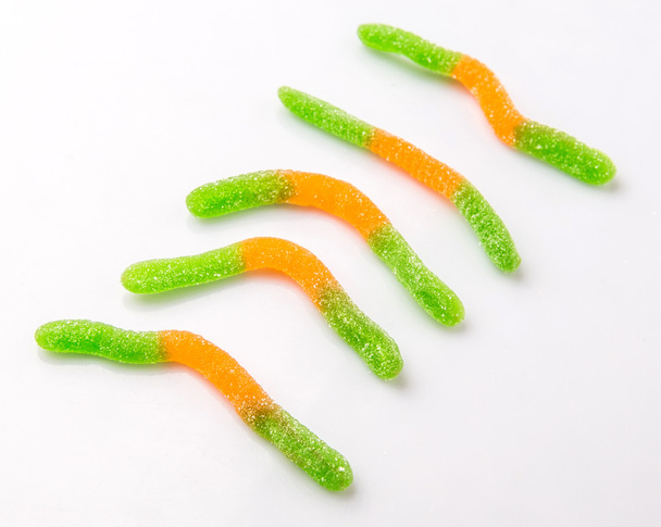 緑とオレンジの砂糖ゼリー キャンディ ストリップ - 写真・画像
