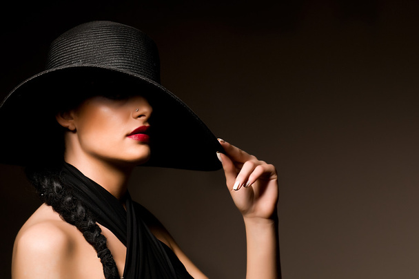 Dama con sombrero
 - Foto, imagen