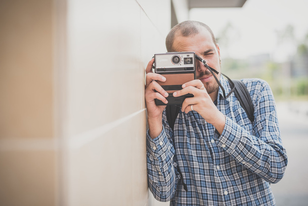 Modern man with vintage camera - Φωτογραφία, εικόνα