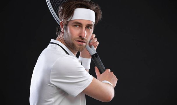 Tennis player with racket. Man athlete playing isolated on background - Photo, Image