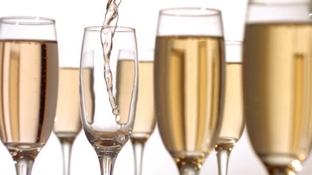 Pouring champagne into glass - Materiaali, video