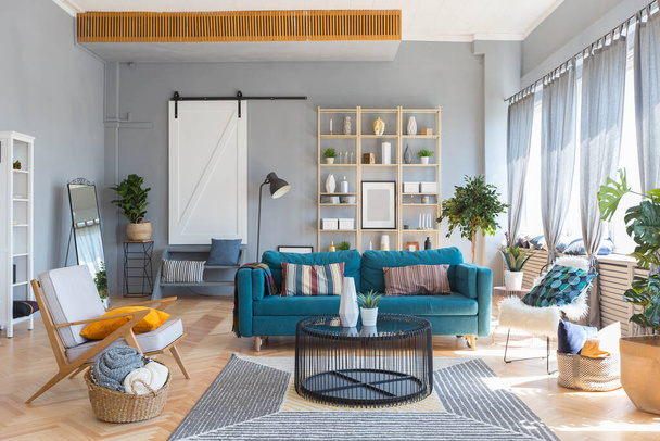 elegant creative modern trendy interior of a spacious open plan Scandinavian style studio with seating and sleeping areas - Фото, зображення