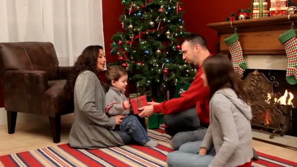 Family giving gifts - Materiaali, video