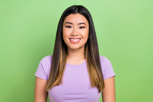 Photo portrait of pretty japanese korean young girl toothy beaming smile wear trendy purple outfit isolated on green color background. - Valokuva, kuva