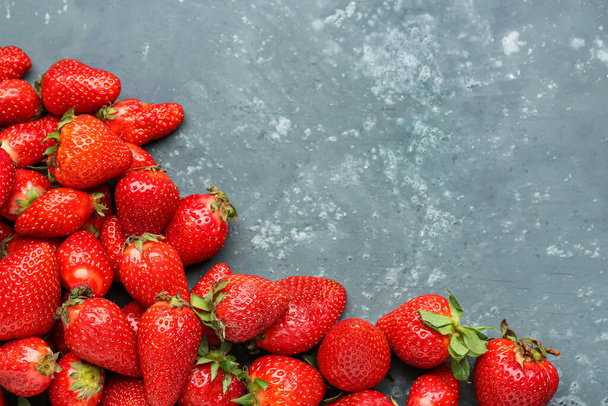 Fresh strawberries on blue background - Φωτογραφία, εικόνα