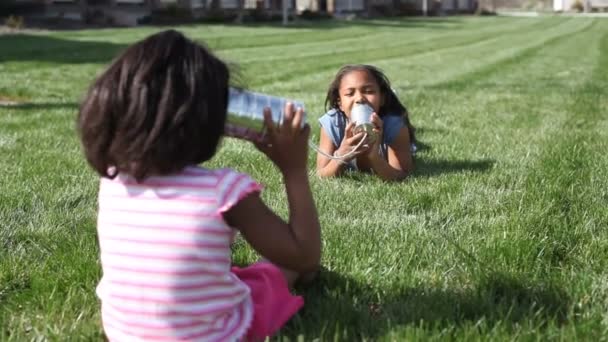Sisters playing on the grass - Filmmaterial, Video