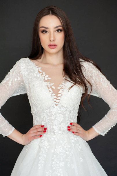 beautiful girl in a white wedding dress  - 写真・画像