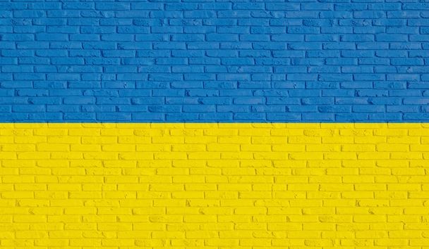 Ukrainian national colors on a wall. Brick wall in blue and yellow the national colors of Ukraine. 3D illustration - Foto, afbeelding