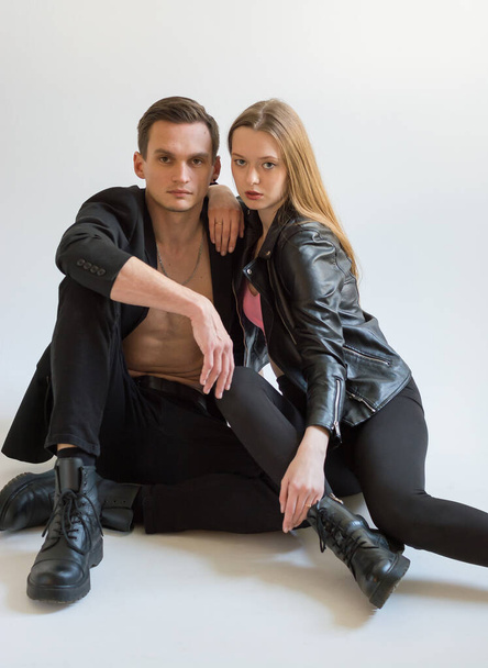 A beautiful young couple - a guy and a girl, fashion models. Couple in love - Fotografie, Obrázek