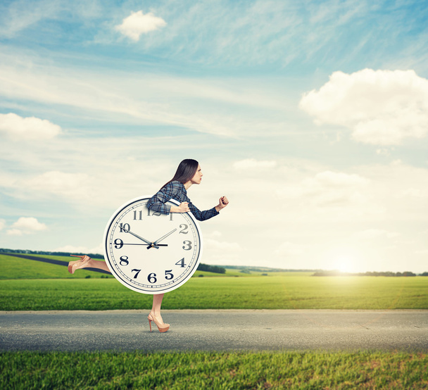 woman holding big clock - Photo, Image