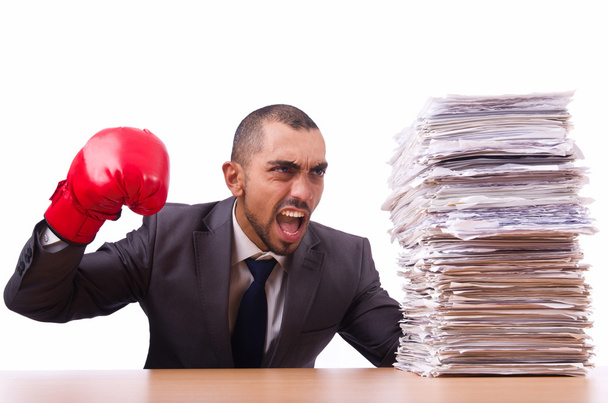 Angry businessman with stack of papers - Photo, Image