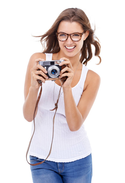 Фотографічна досконалість. Молода жінка тримає камеру на білому тлі
 - Фото, зображення