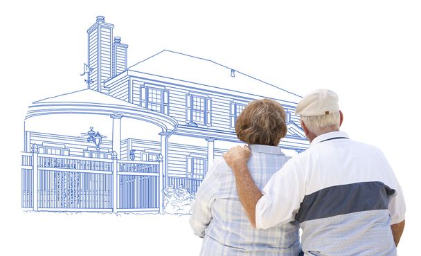 Ogarnięcie para starszy patrząc na rysunek domu na biało - Zdjęcie, obraz