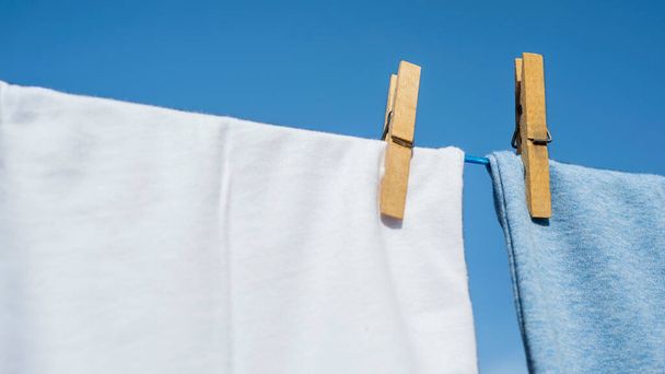 Clothes hanging to dry on a laundry line - Foto, Imagem