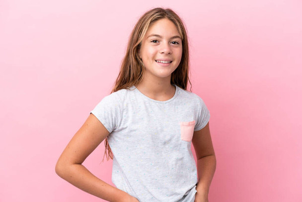Little caucasian girl isolated on pink background laughing - Zdjęcie, obraz
