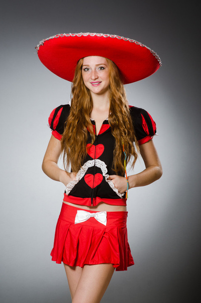 Nice woman wearing red sombrero hat - Photo, Image