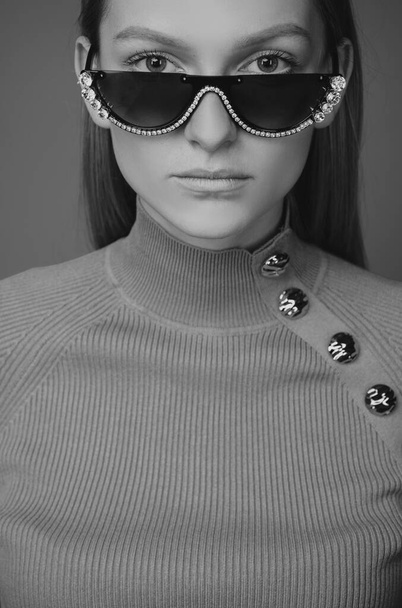Fashion trendy style sunglasses. Woman with glasses. Beautiful female model - Foto, immagini