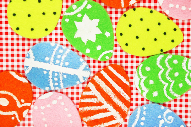 Felt Easter eggs on craft paper background - Foto, afbeelding