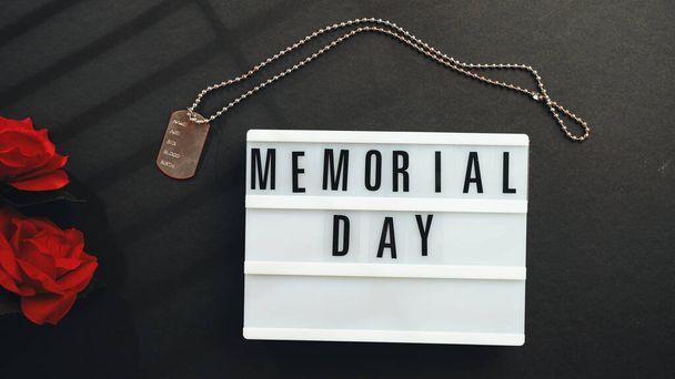 Memorial day background with signboard and military plate. - Photo, image