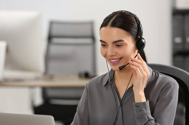 Hotline operator with headset working in office - Fotografie, Obrázek