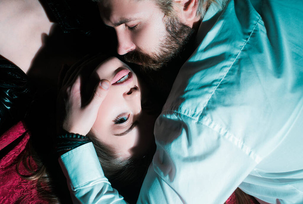 Romance seduction flirt, romantic couple. Portrait close up of young sexy couple. Passionate sexy moments. Man kissing and embracing woman in the tender passion - 写真・画像
