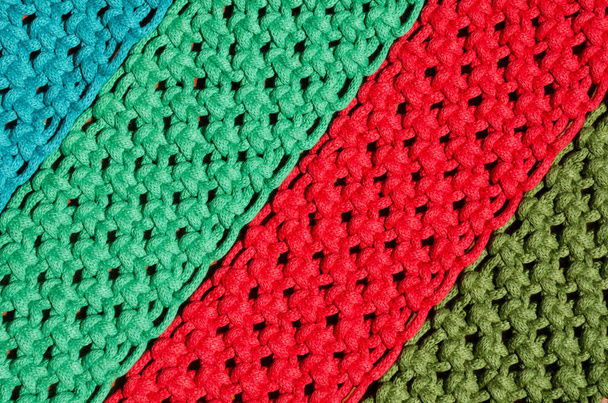 Des motifs en osier. Macrame, un nœud carré de fils multicolores. - Photo, image