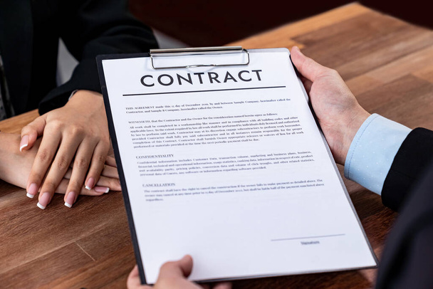 Businessman review agreement document before signing contract. Reading carefully to ensure trade deal align with business goals. Professionalism for business decision making concept. Jubilant - Photo, Image