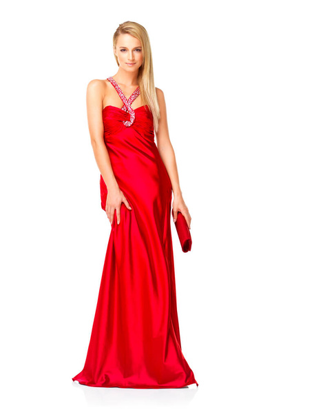 Young and elegant woman in a red dress or fancy gown while feeling confident and beautiful against a copy space background. Lady wearing designer clothes and accessories for prom, bridesmaid or event. - Foto, Imagen