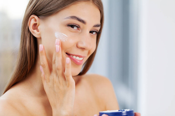Body Care, Woman Applying Moisturizing Lotion Or Cream Caring For Skin At Home. - Photo, Image