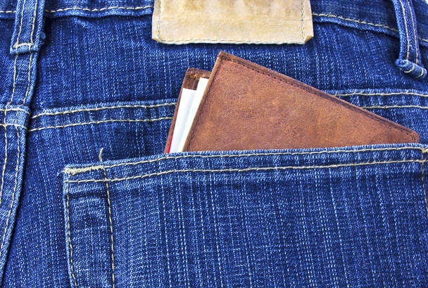 Leather wallet with money in jeans - Foto, imagen