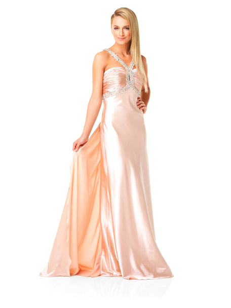 Beautiful, elegant and fashion in a fancy dress or evening gown for prom, formal event or ball against white studio background. Confident woman wearing bridesmaid clothing for wedding party. - Fotó, kép