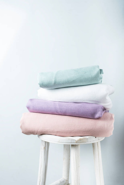 Sewing concept: linen fabric in different pastel colors, selective focus image - Valokuva, kuva