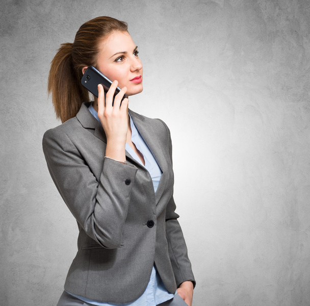Businesswoman talking on the phone - Foto, immagini
