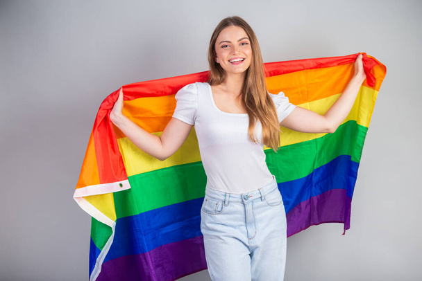 Blonde Brazilian woman with LGBT flag - Photo, Image