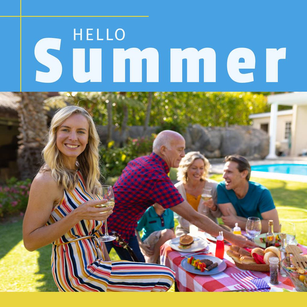 Composition of hello summer text over caucasian family having drink in summer garden. Hello summer, family time and vacation concept digitally generated image. - Fotó, kép
