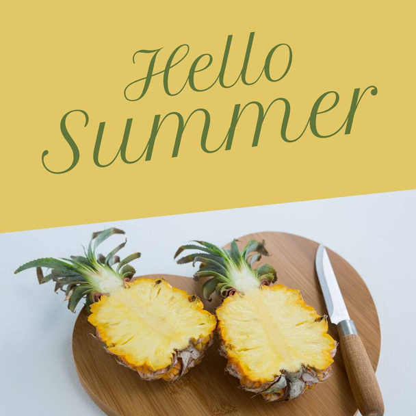 Composite of hello summer text and halved pineapple with knife and cutting board, copy space. Summer, season, welcome, food, fruit and healthy concept. - Фото, зображення