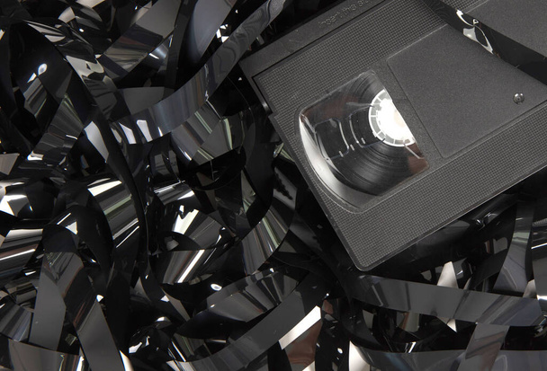 Broken video tape isolated on a white background - Foto, Imagem