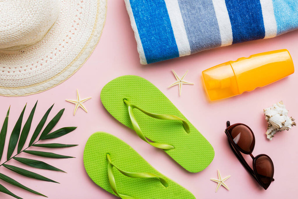 Summer vacation concept flat lay. beach accessories and towel top view. Space for text. travel concept. - 写真・画像