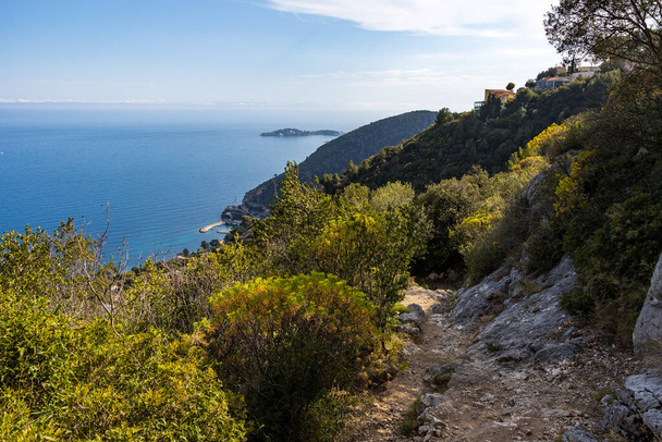 Path descending towards Eze-Bord-de-Mer with a view of the Mediterranean - Photo, Image