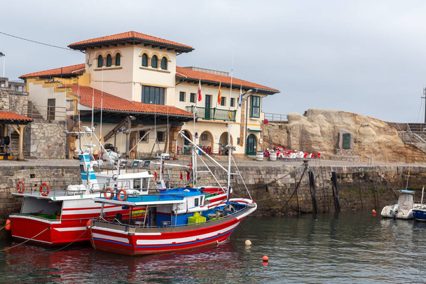 photo of the beautiful fishing port in the spanish town of comillas, cantabria. - Photo, Image