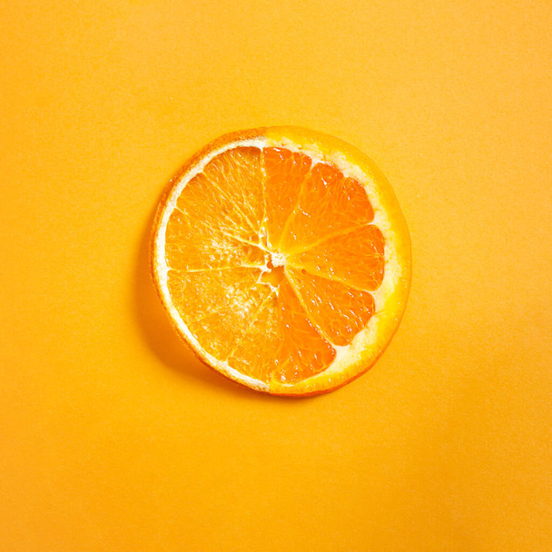Skin moisturizing concept. Comparison of dry and juicy oranges. - Foto, Imagen