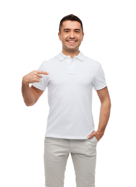 smiling man in t-shirt pointing finger on himself - Foto, Imagem