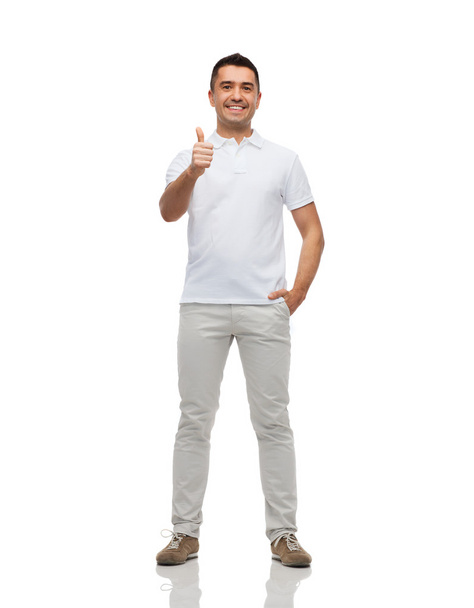 smiling man showing thumbs up - Fotó, kép