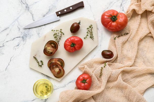 Board with fresh tomatoes on white background - Φωτογραφία, εικόνα